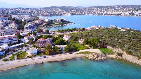 Aerial bird's eye video taken with drone of famous bay and port of Porto Rafti with turquoise clear waters, Mesogeia, Attica, Greece