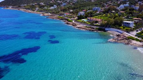 Aerial bird's eye view video taken by drone of clear water seascape of Avlaki, Porto Rafti, Mesogeia, Attica, Greece