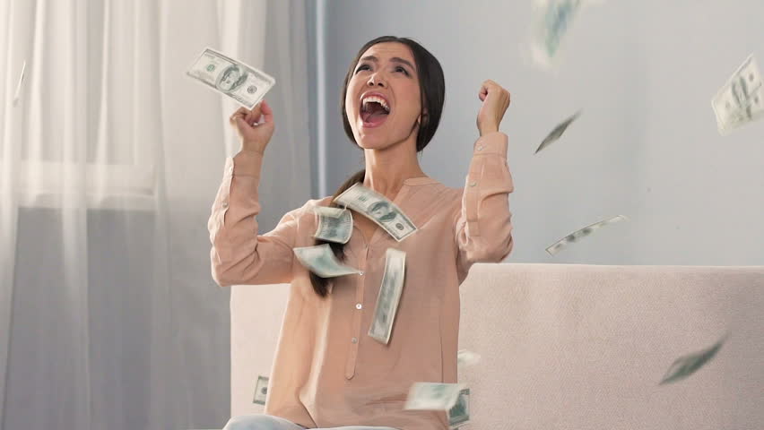 Girl sincerely rejoicing money falling from sky, winning lottery, slow motion Royalty-Free Stock Footage #33677386