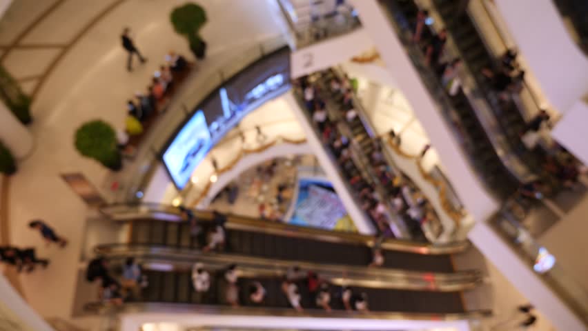 Top view people On Escalators In shopping mall