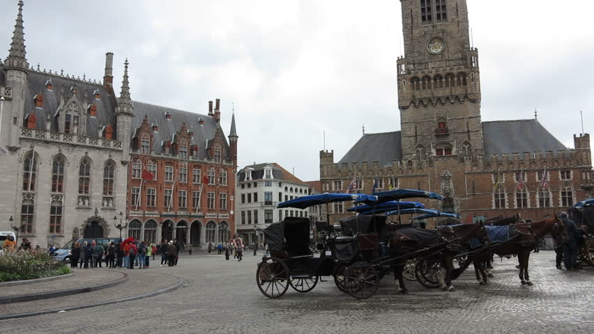 Bruges, october 2017, horses in Market Markt square