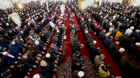 ISTANBUL, TURKEY - DEC 8: Friday pray in congregation male Muslims Fatih Mosque on December 8, 2017 in Istanbul, Turkey.