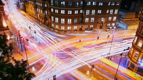 Wide angle aerial view of traffic trails on a busy juncture in London, England, UK