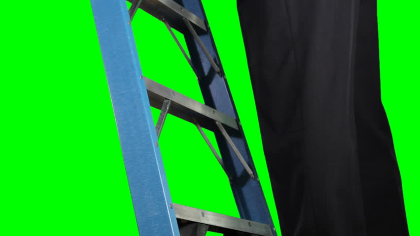 Businessman climbing ladder. Shot with green screen.