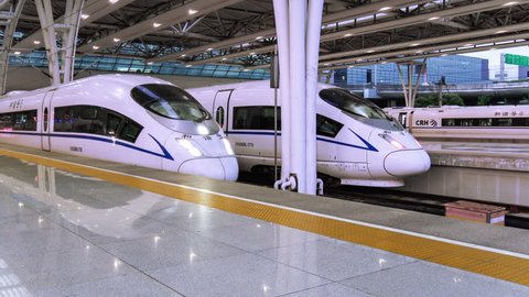 SHANGHAI, CHINA - CIRCA FEB, 2017: A Chinese Bullet Train leaves Hong-qiao Station in Shanghai, China.