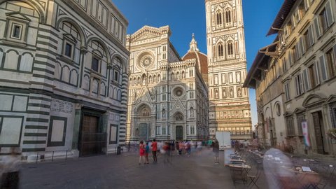 The front of The Basilica di Santa Maria del Fiore timelapse hyperlapse which is the cathedral church (Duomo) of Florence in Italy. shadows moves on facade at sunset