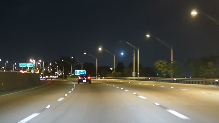 Vehicles traveling at night on highway