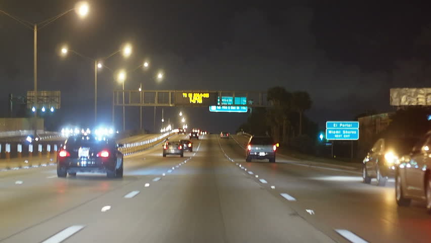 Vehicles traveling at night on highway