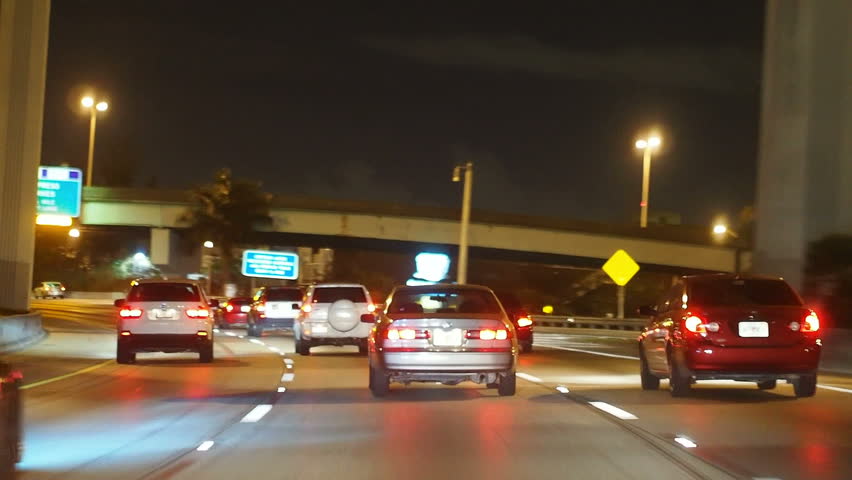Vehicles traveling at night on highway