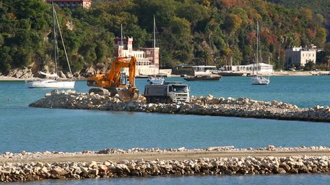Herceg Novi, Montenegro - December, 2017: Construction of marina for yachts in the sea