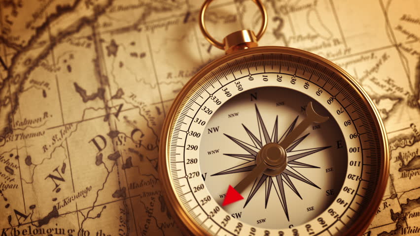 golden compass on old map indicating Stock Footage Video (100% Royalty ...