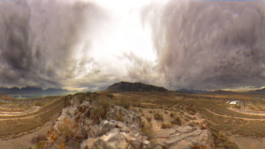 High definition time lapse of a beautiful rocky landscape with stormy clouds shot as a probe. 