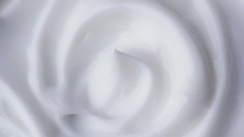Cosmetics cream with rotate. Close-up shot.