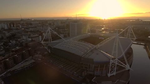 CARDIFF, UK - 2017: Panning aerial view of the Millennium Stadium / Principality Stadium in Cardiff at sunrise.