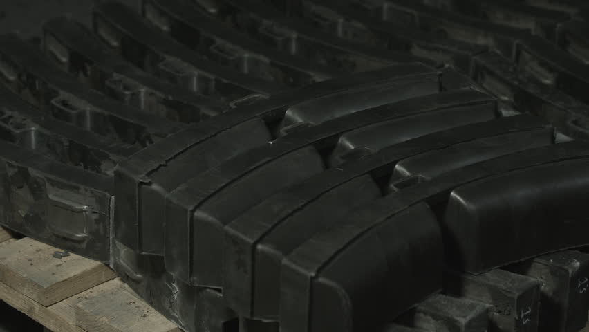 Brake shoes for trains. Spare parts in the production shop of the plant. Close up. Without color correction. | Shutterstock HD Video #33750388