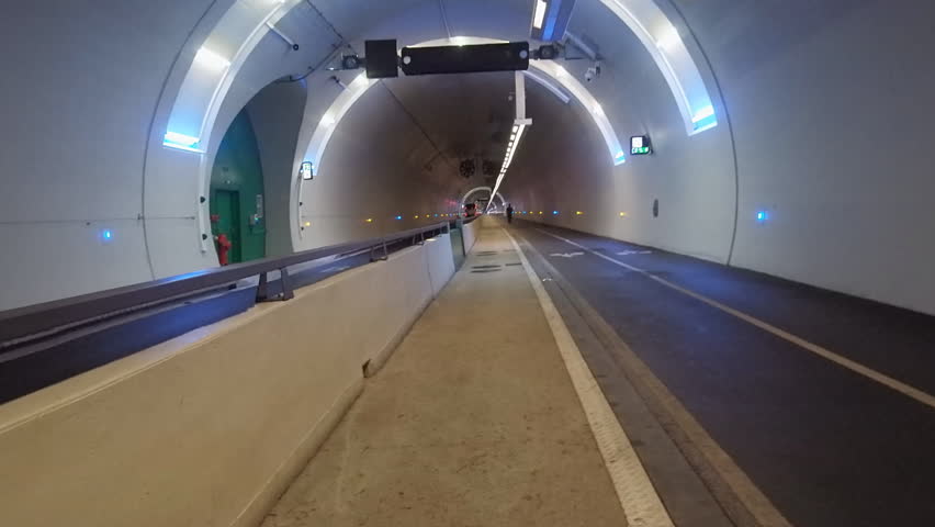 Tunnel underground passage. Lanes for pedestrians and cyclists, lighting, ventilation system hyper lapse time lapse Royalty-Free Stock Footage #33751975