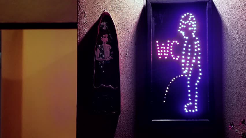 male figure on neon for indicate the men