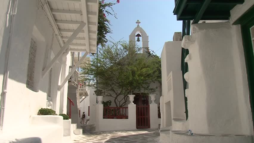 A typical narrow alley in the town of Mykonos, Greece