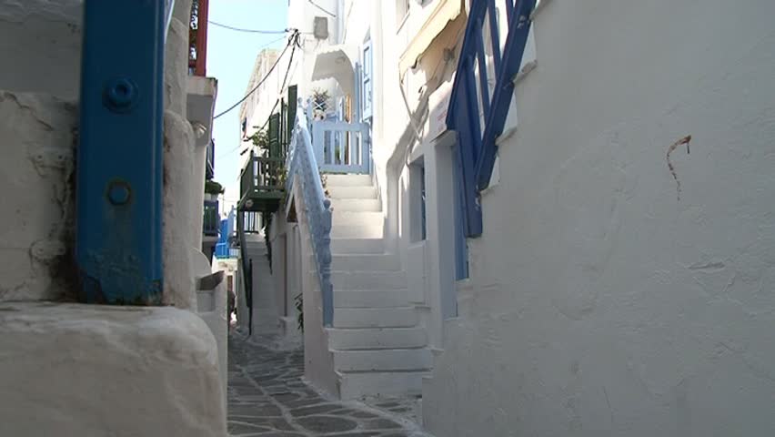A typical narrow alley in the town of Mykonos, Greece