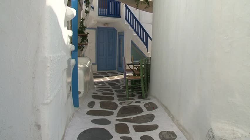 A typical narrow alley in the town of Mykonos, Greece