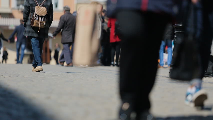 Europe, Lviv 2017. People walking the square. Rush hour. Outdoors.