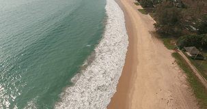 Aerial scenery shooting of beautiful natural landscapes of lagoon ocean with waves along seashore.Bird's eye view video of exciting sea in far east Asia