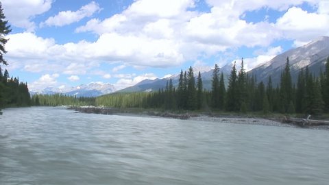 Glacial river and clouds in the Canadian Rockies (timelapse) 