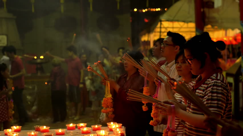 BANGKOK, THAILAND  - FEBRUARY 9, 2013: Thai-Chinese people praying for a