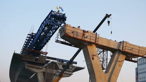Bridge Girder Erection Machine for Highway construction working with crane at construction site