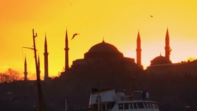 istanbul silhouette 4K sunset zoom out Hagia Sophia, Blue Mosque, Topkapi Palace, Maiden's tower and beautiful sunset istanbul bacround. Turkey Cityscape 