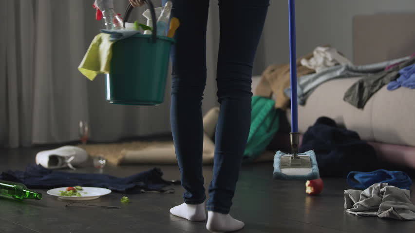 Woman horrified by mess left after party in her apartment, cleaning service. Housekeeper feeling shocked by room view after bachelor event, chaos and dirt washing, exhausted overworked wife, cleaner
 | Shutterstock HD Video #33804226