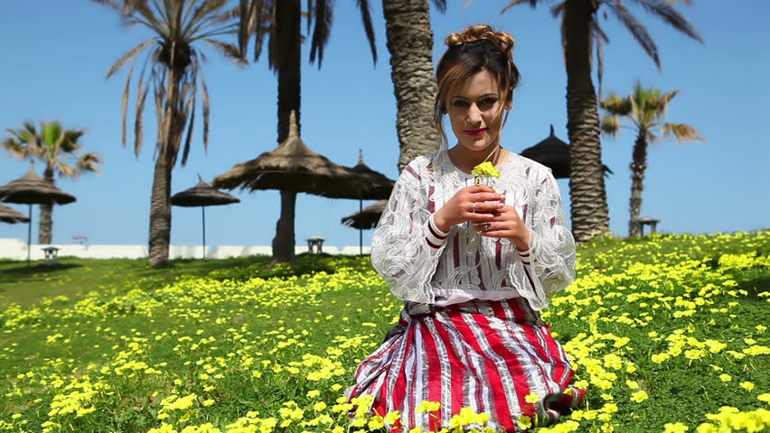 Middle-Eastern model with authentic traditional clothing and authentic makeup.