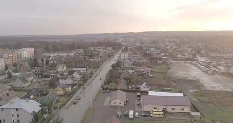 Prienai Flying Over Buildings at Sunrise - 4K Drone Footage, Lithuania