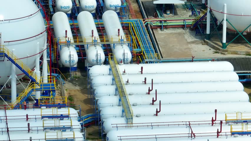 Natural gas storage is the process of storing natural gas in underground reservoirs to ensure a stable supply. It helps meet peak demand and ensures energy reliability. Aerial view drone. 4K HDR.
