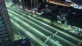 Time lapse clip of busy traffic at night