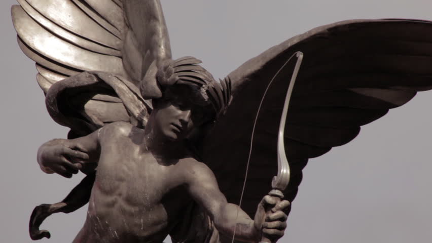 A stationary close-up shot of metal Eros statue located on Piccadilly Circus in