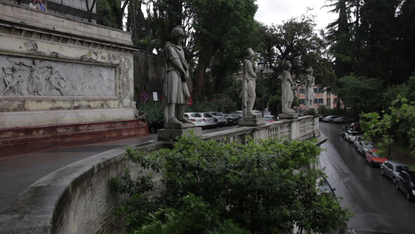 Statues overlooking a roman roadway