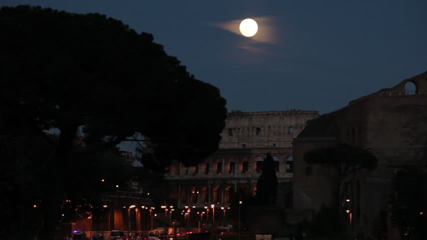 Amazing full moon over the Roman Colosseum