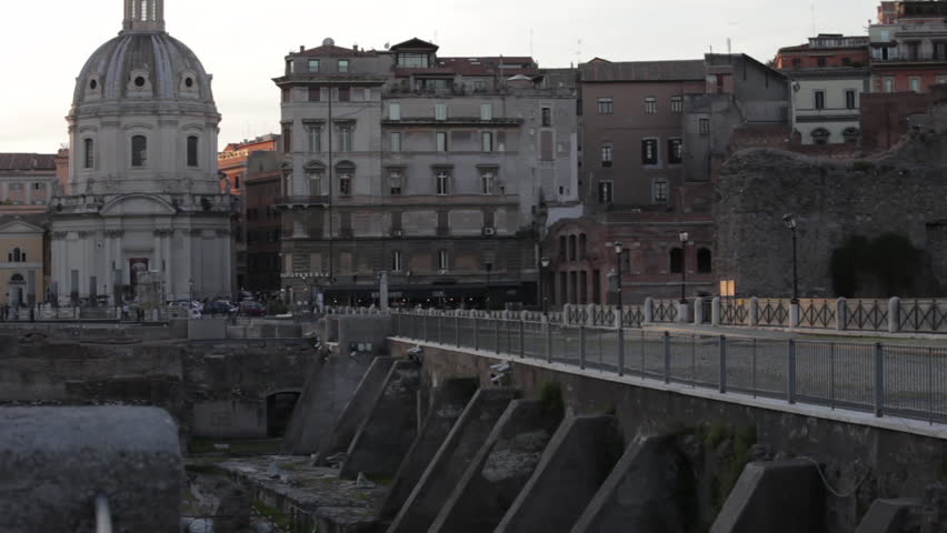 Distant shot of Santissimo Nome di Maria al Foro Traiano over bridge