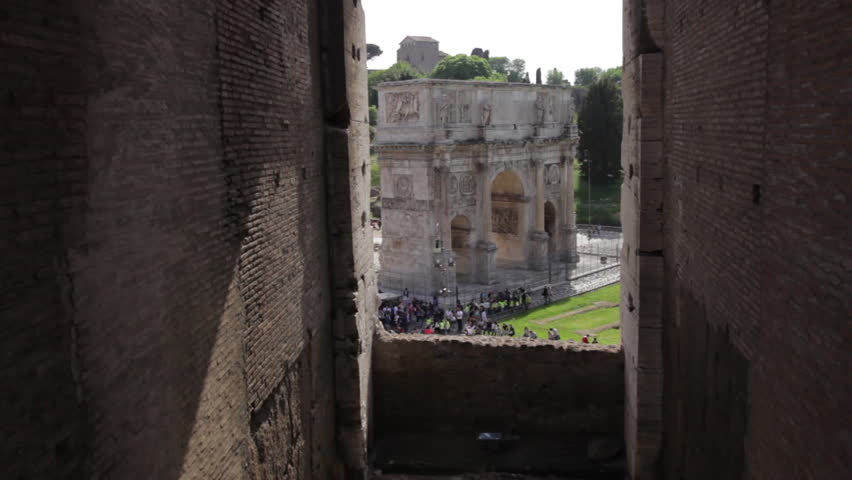 Static shot out of a window in the Colosseum towards the Arch of Constatine