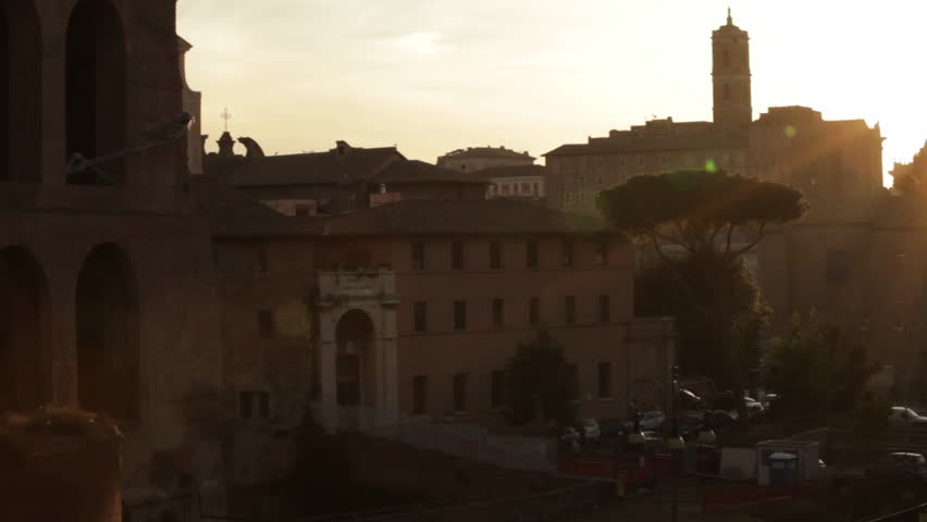 Static shot of Italian buildings with lens flare