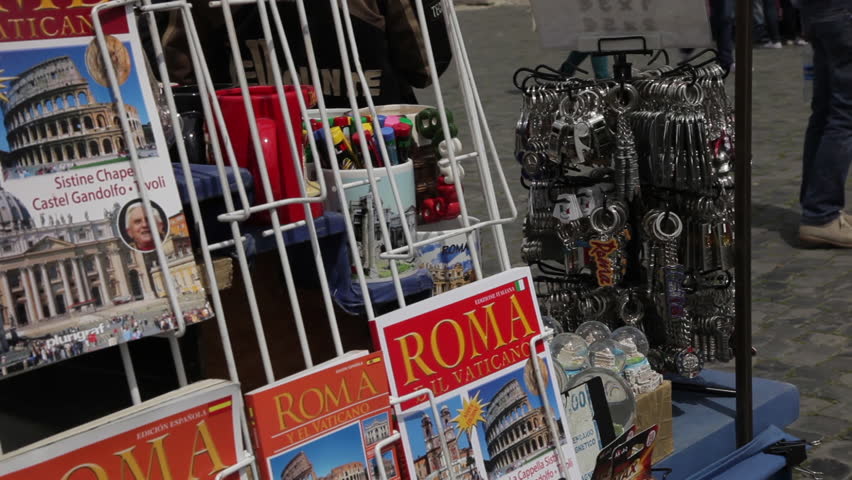 History, tourism, and guide books at souvenir spot at the Colosseum.