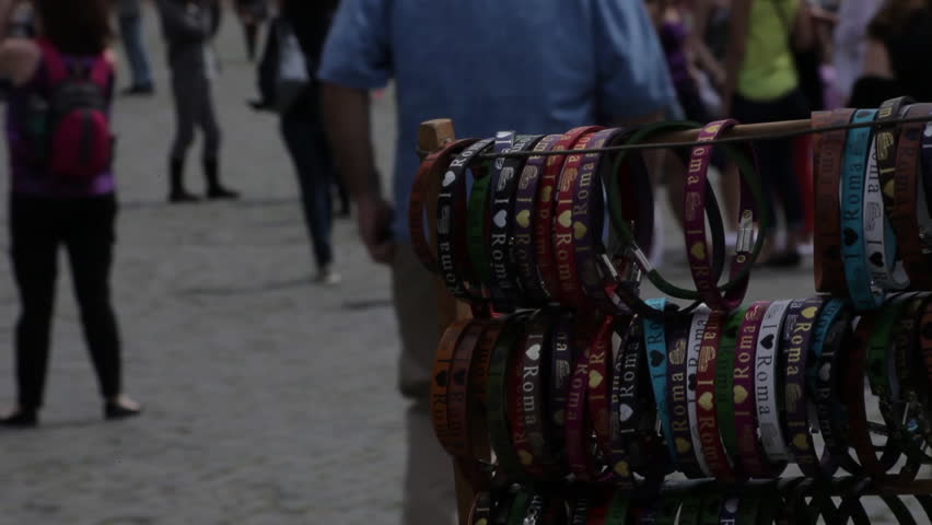 Shot of souvenir bracelets blowing in the wind at the Colosseum.