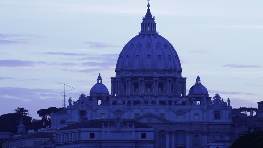 A blue-looking St Peter's dome at dusk