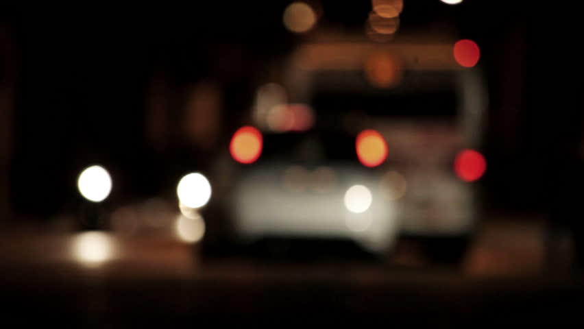 Unfocused night footage of intersection