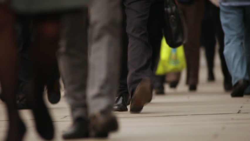 Time lapse of people's feet walking on the London Bridge
