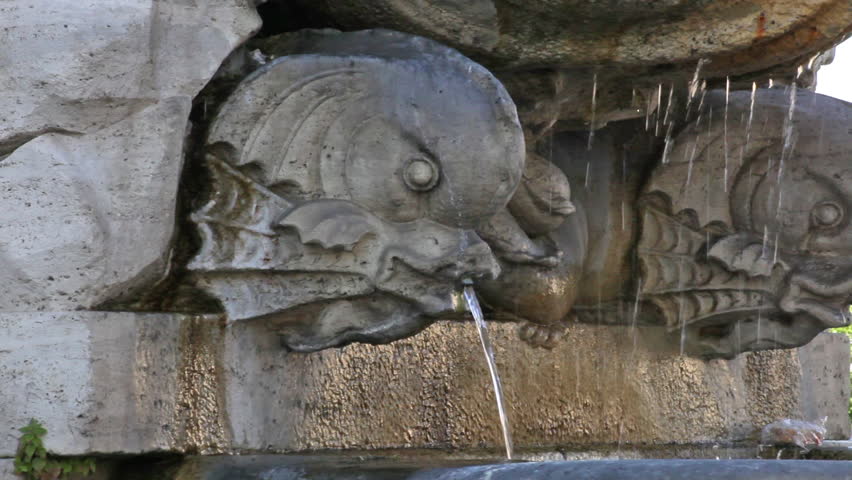 Extreme close up of spitting feature of fountain