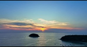 
stunning sunset over the islands. 
Pu island is in the middle between Kata beach and Karon beach in Phuket.
Nature video High quality footage in nature and travel concept.