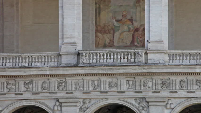 Painting on exterior wall of building surrounding Piazza San Giovanni