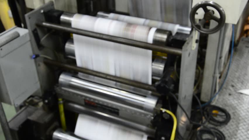 print press hit set roll paper goes through the rollers after passing the